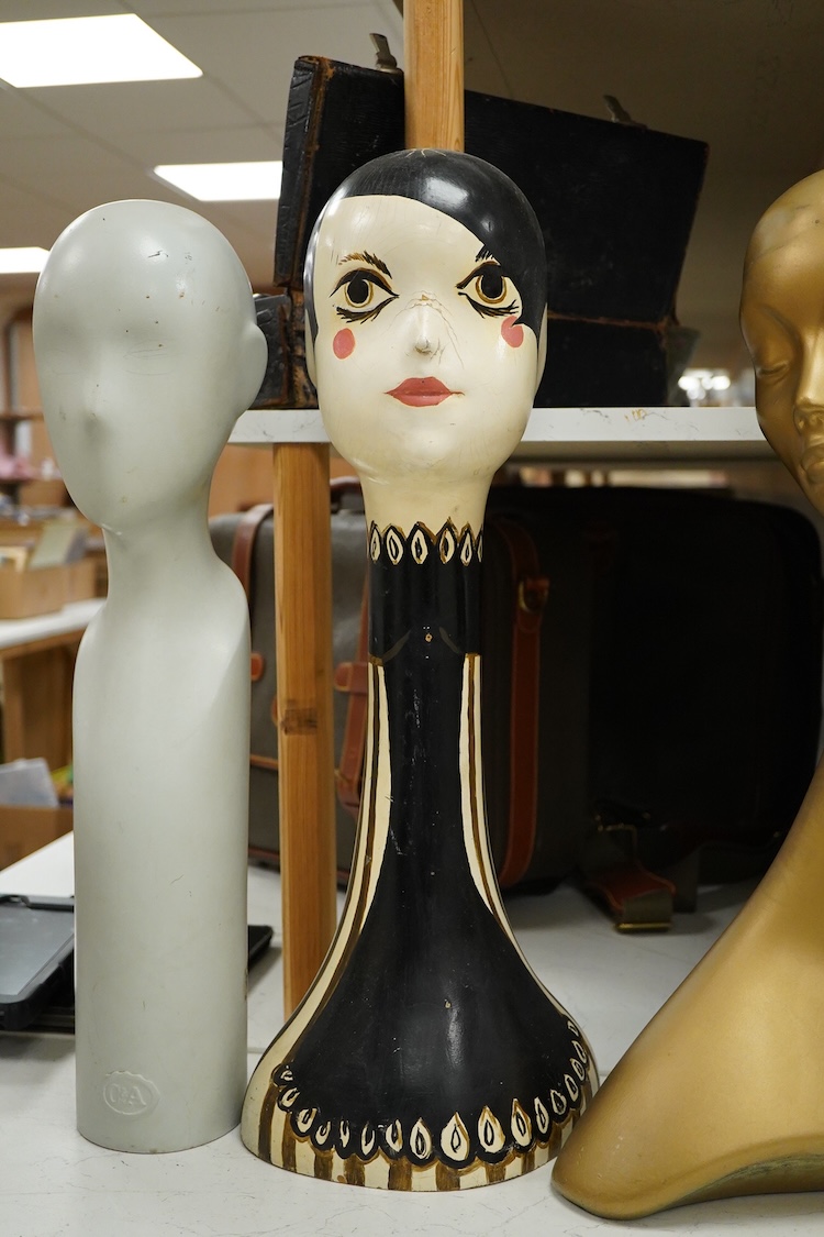 Two painted milliner’s hat display stands and two others, tallest 63cm high.